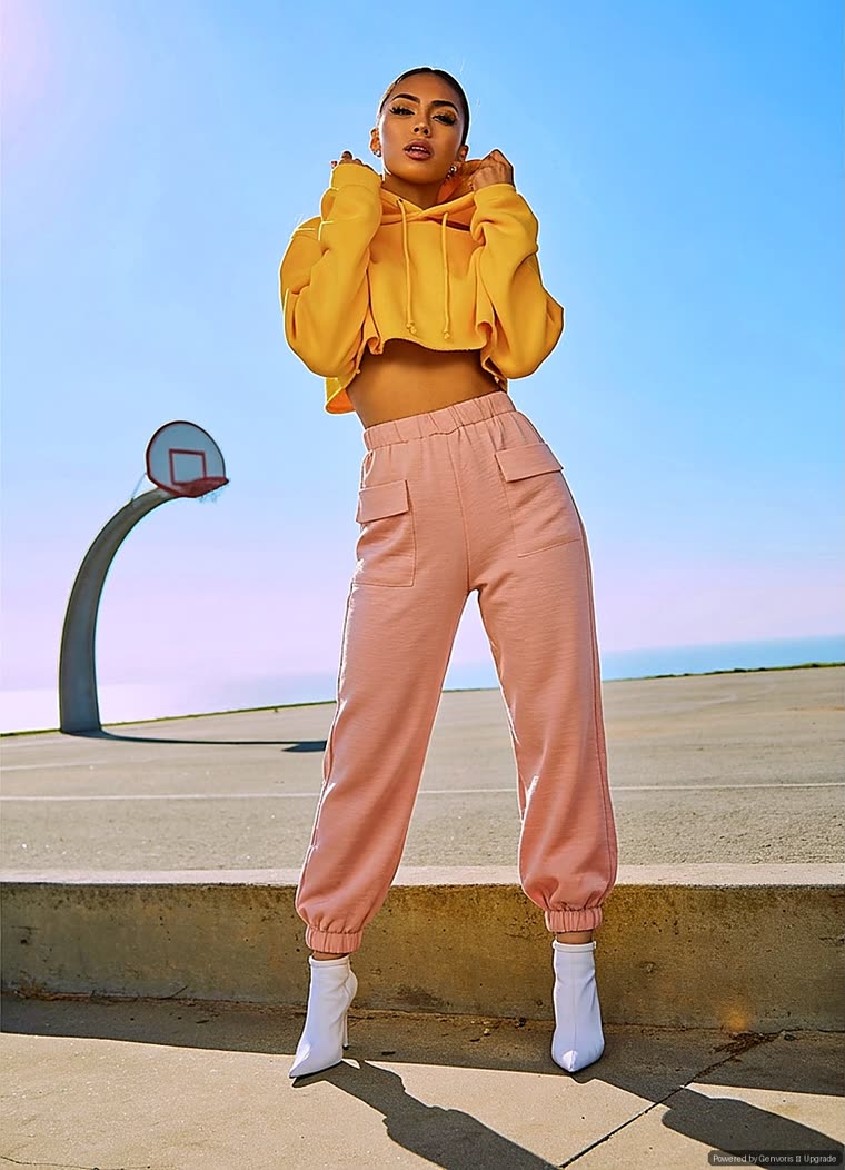 Virtual try-on result: the same shopper wearing blush jogger pants